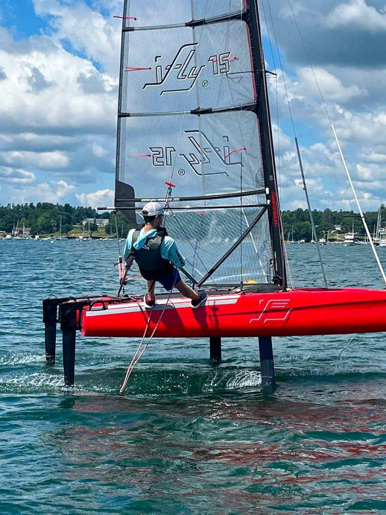 Young sailors training and mastering flight control on the iFLY15 catamaran.
